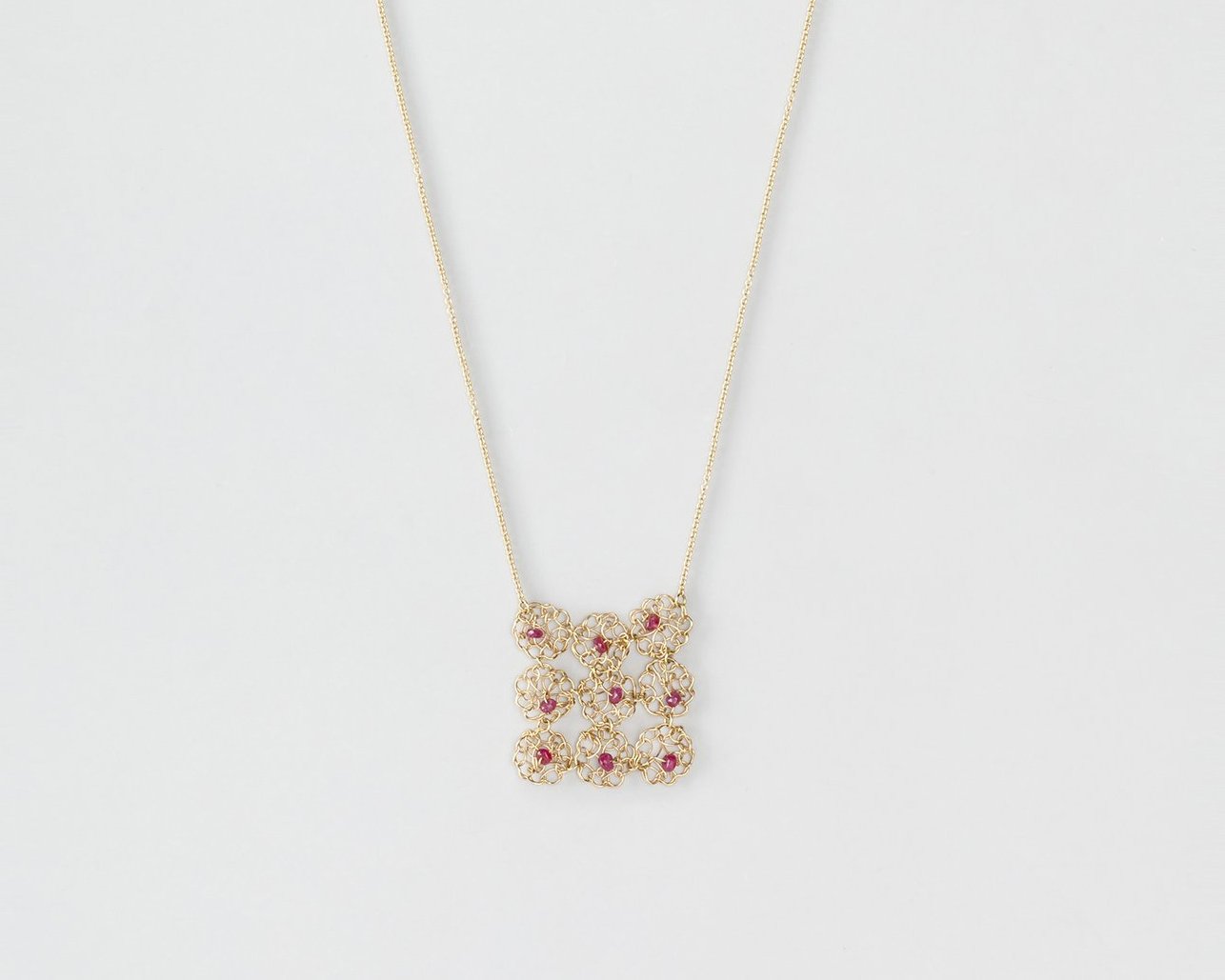 18KT yellow gold short necklace with rubies – Collage