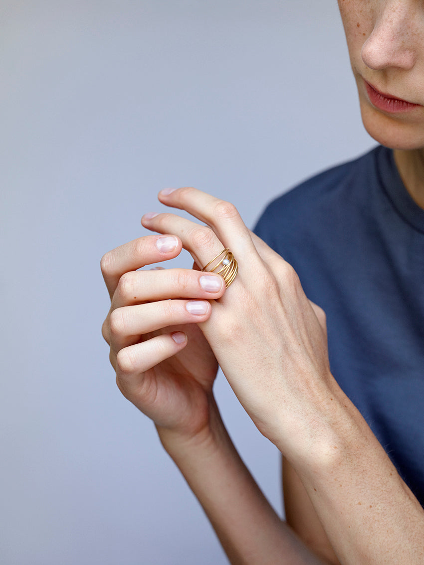 18 KT yellow gold ring with akoya pearl worn by female hand - NonStop