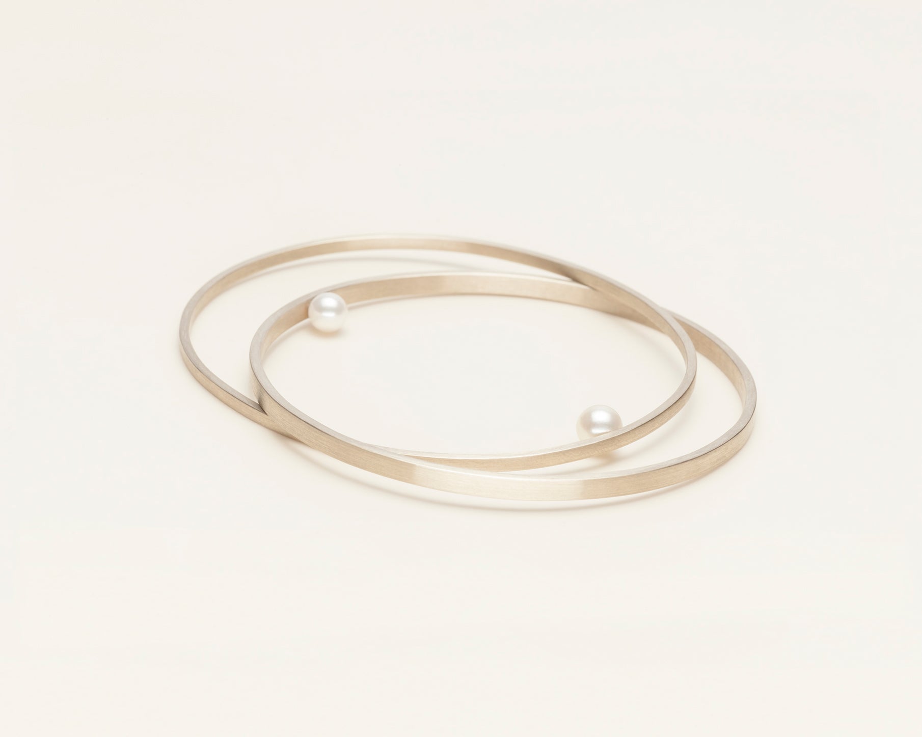 18KT yellow and white bands bracelet with akoya pearls - Planets B