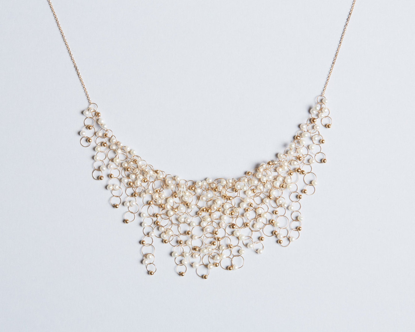 18KT yellow gold necklace with freshwater pearls - Infinito N