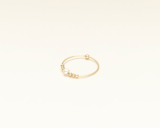 18KT thin yellow gold ring with gold spheres and freshwater pearl - Toi Perla Oro