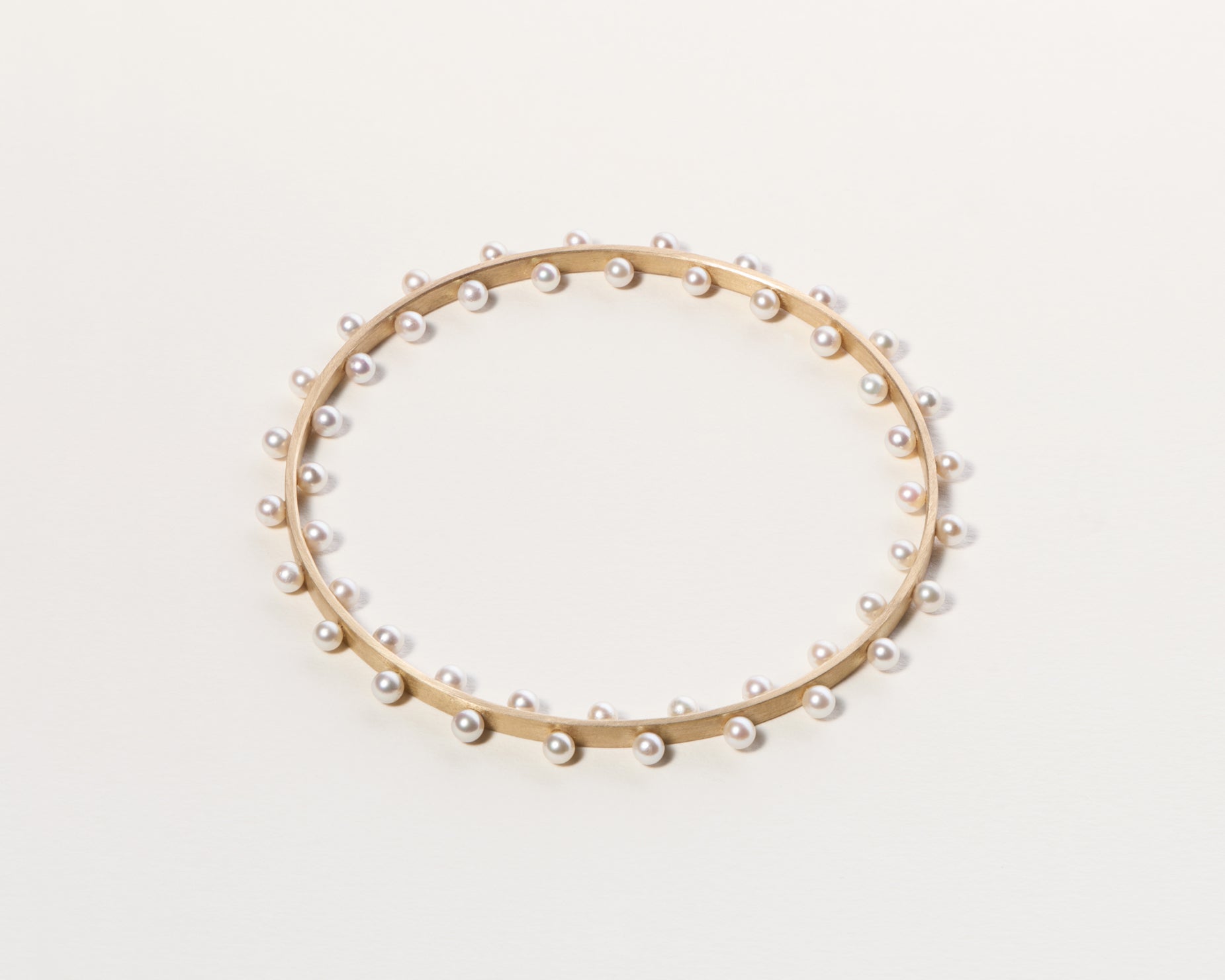 18KT yellow, white or rose gold bracelet with freshwater pearls - In-Out