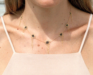 18KT yellow gold chained studs necklace with freshwater pearls worn by a female neck - Teodolinda N